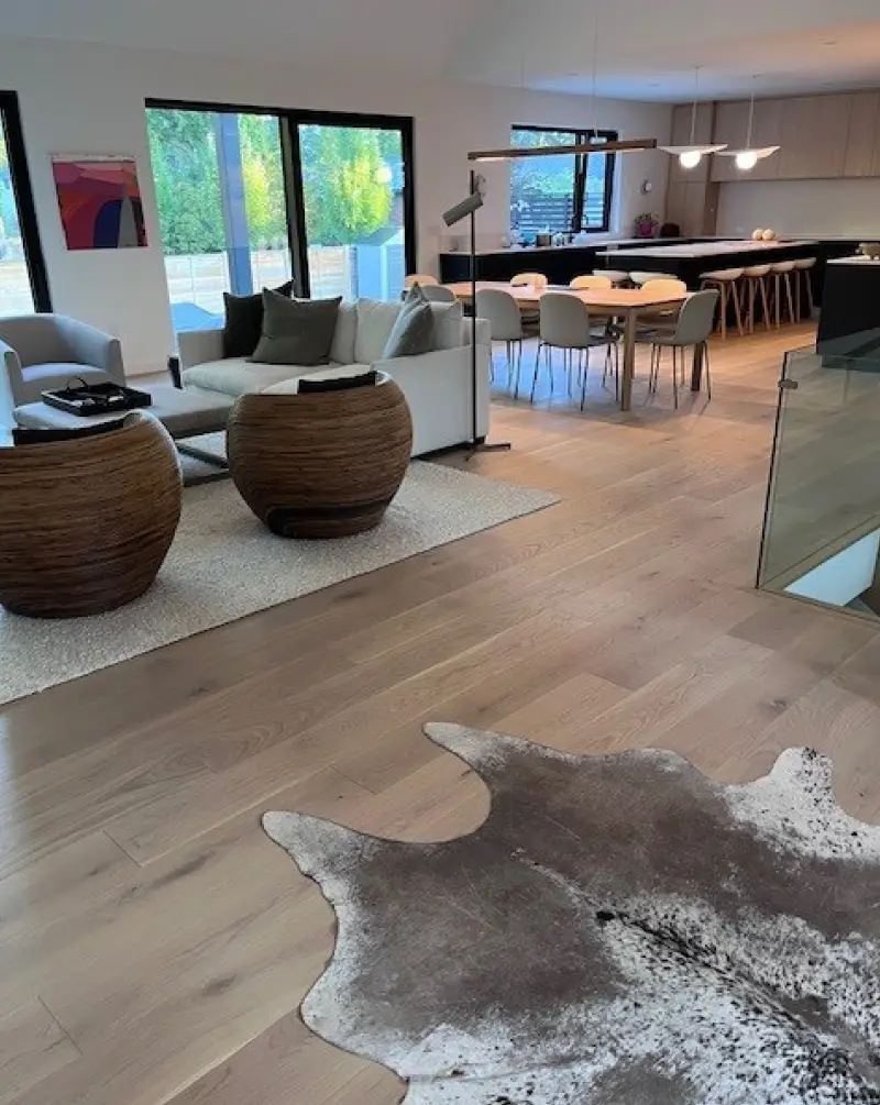 An interior installation photo showcasing the Buri classique wood flooring