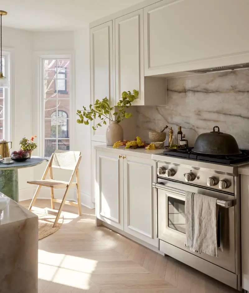 An interior installation photo showcasing the Vali chevron wood flooring