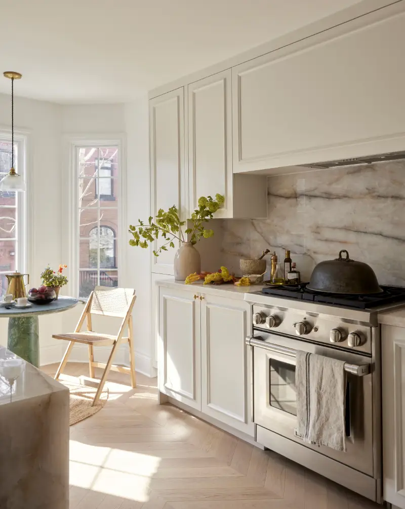 An interior installation photo showcasing the Vali chevron wood flooring pattern